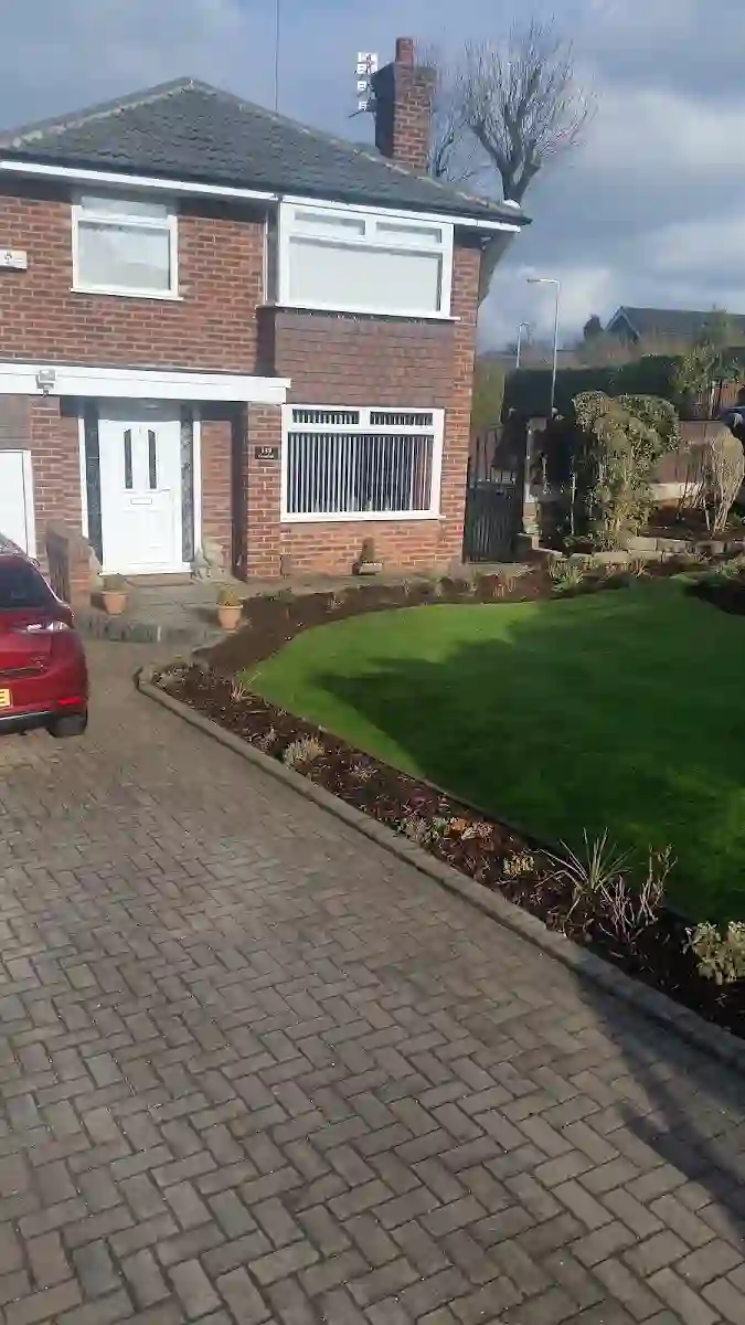 Front garden and block-paved driveway maintained by EU Gardening Services