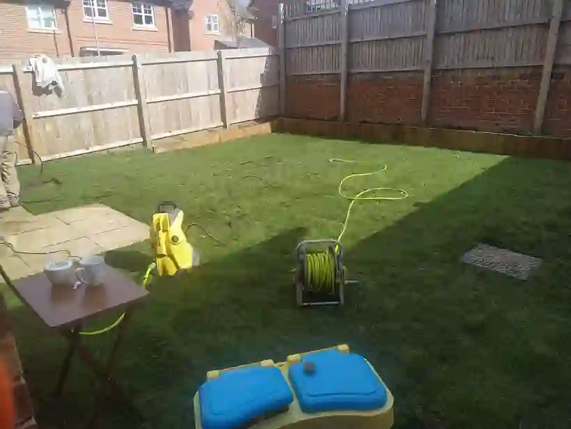 Tidy back garden lawn after a clearance by EU Gardening Services